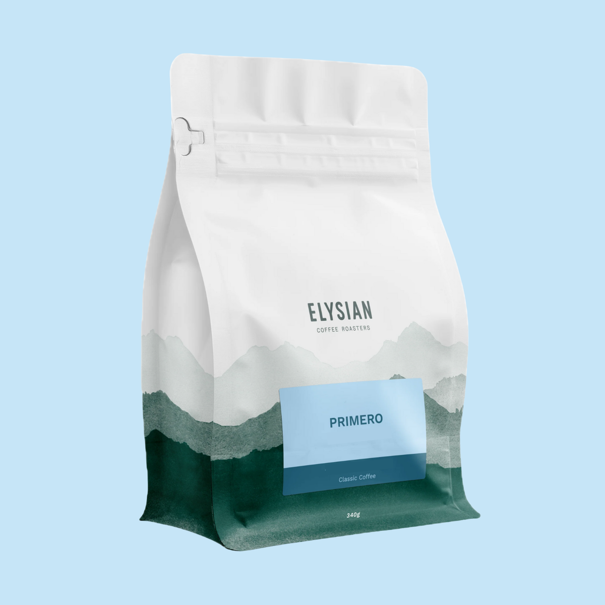 Primero filter coffee bag, white with painted green mountains, on a light blue background